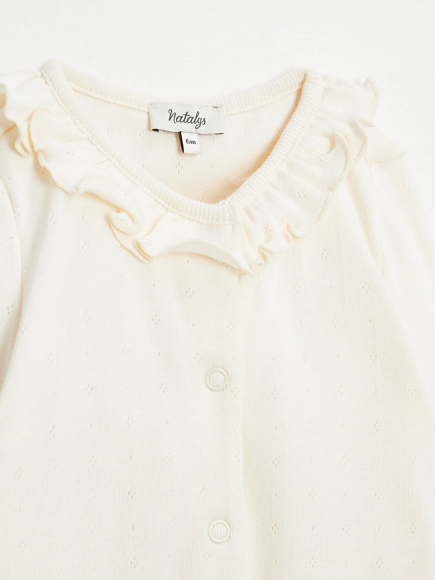 אוברול רגליות ארוך עם מלמלה בגוון קרם-לבן