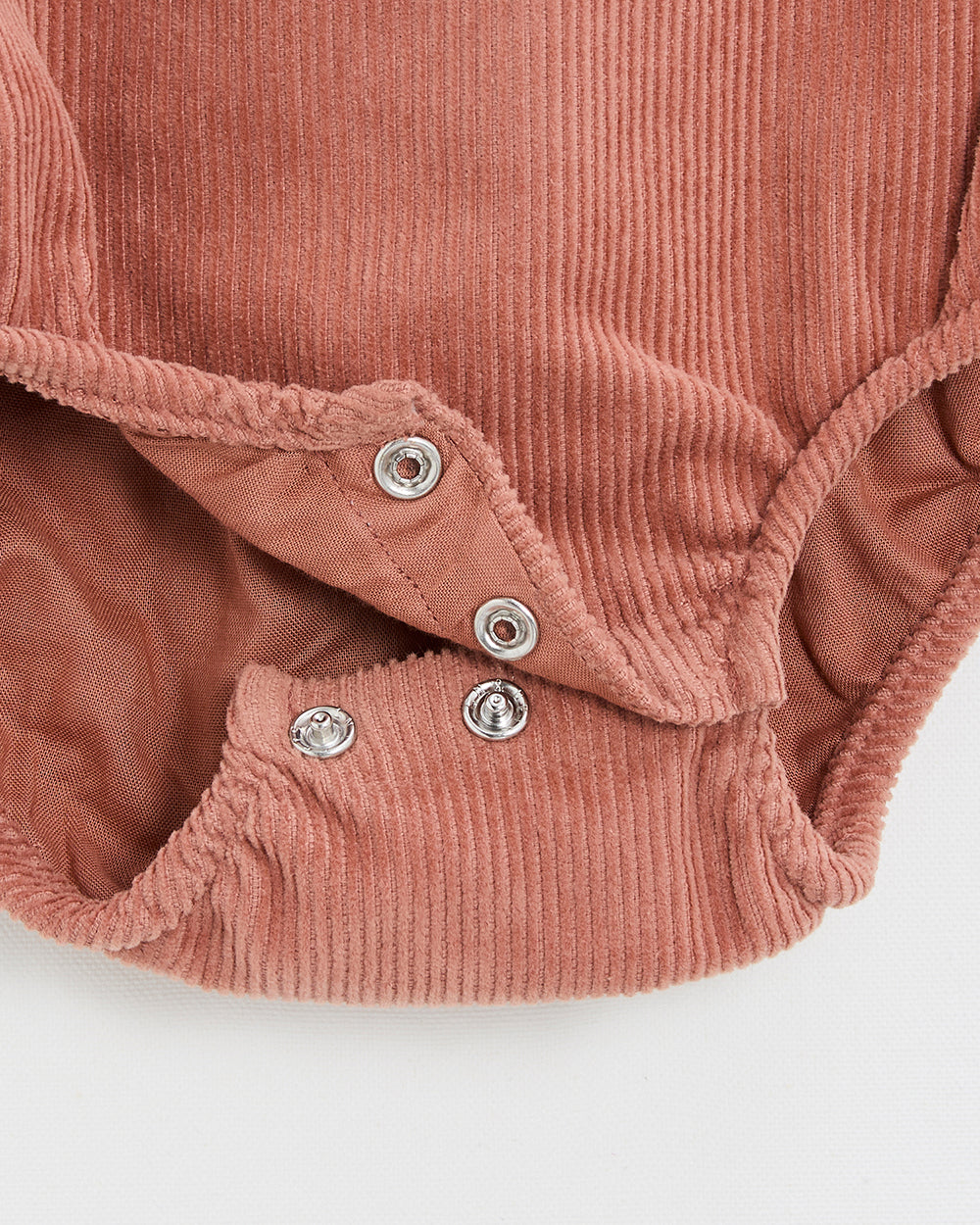 רומפר קטיפה בצבע ורוד בגוניה